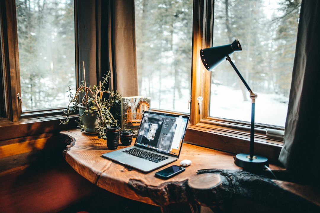 Cozy home office desk in the evening