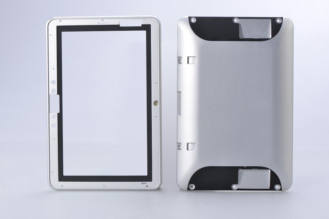 Tablet-style display with VESA wall-mount brackets attached