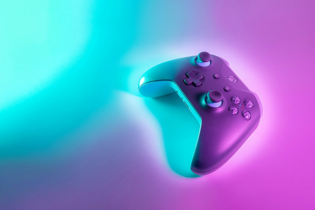Wireless game controller with glowing accents