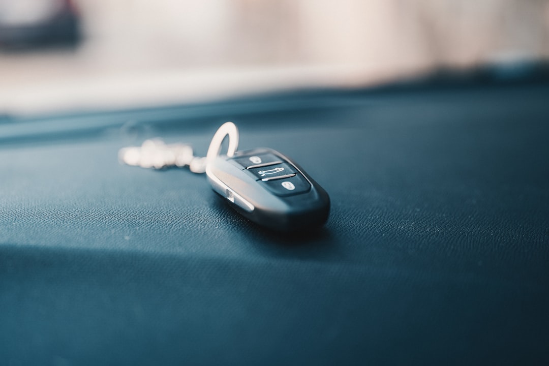 Car key fob resting on fabric