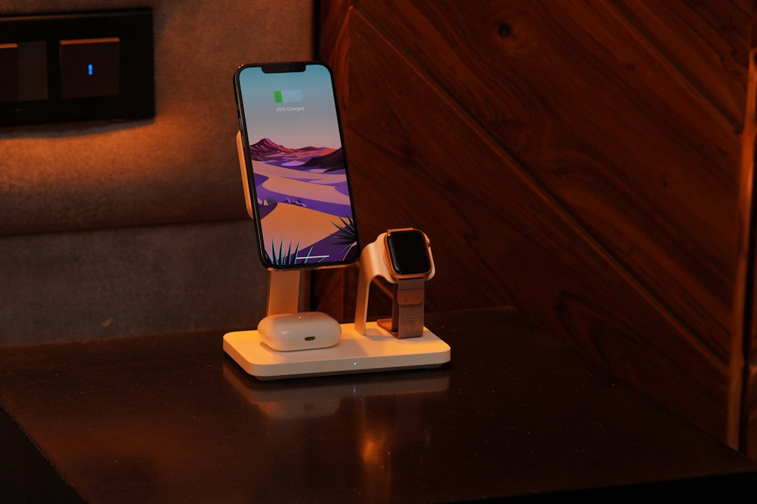 Multi-device charging dock holding a phone, watch, and earbuds case
