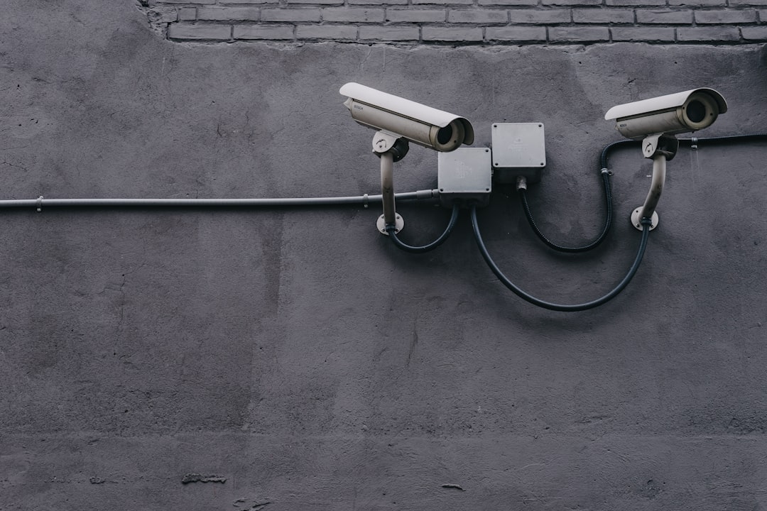 Outdoor security cameras mounted on an exterior wall