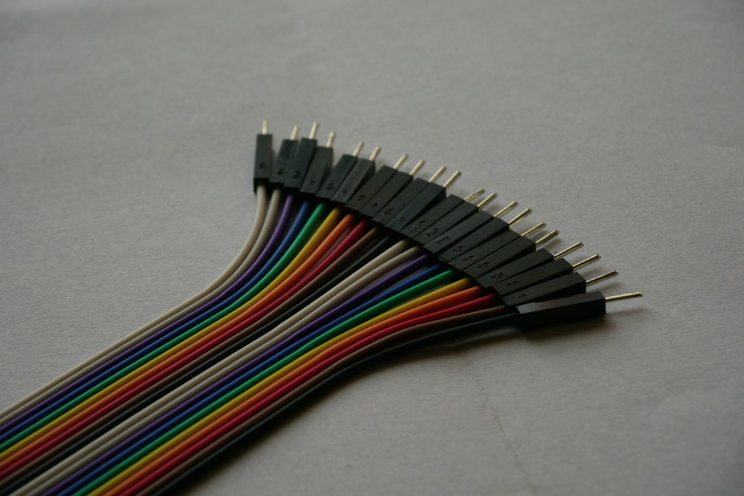 Colorful jumper wires fanned out on a work table