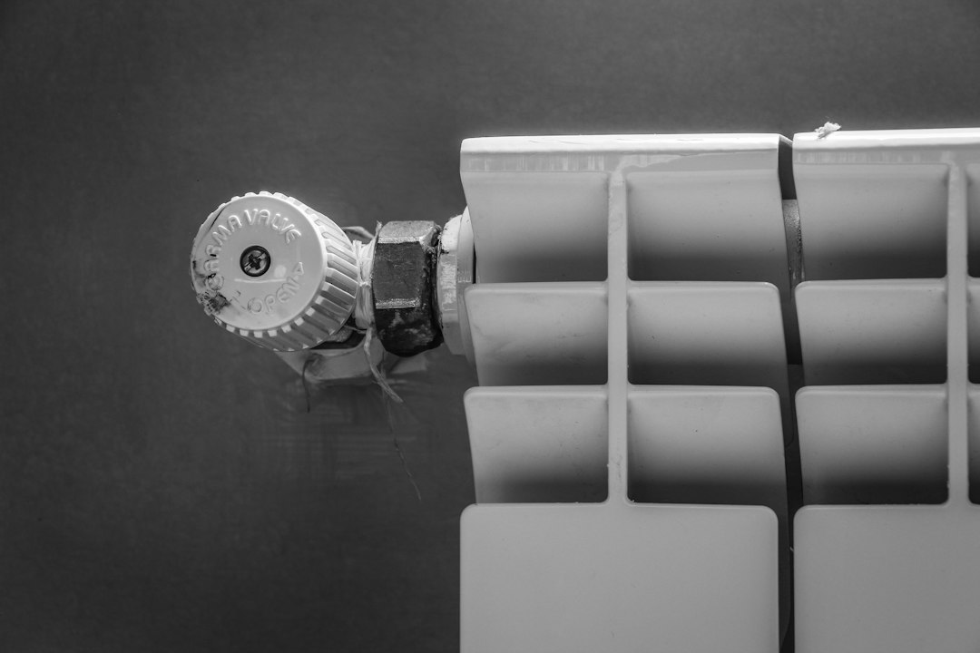 Close-up of a radiator valve on a home heating unit