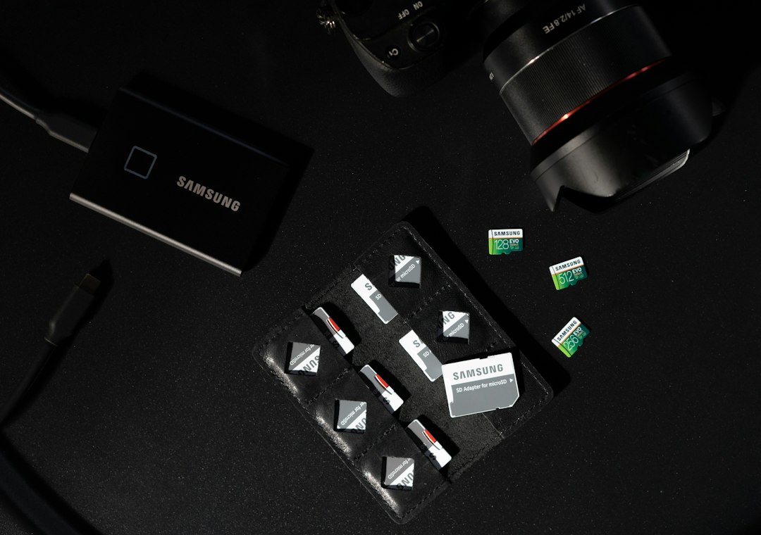 Memory cards and a portable SSD arranged on a black surface