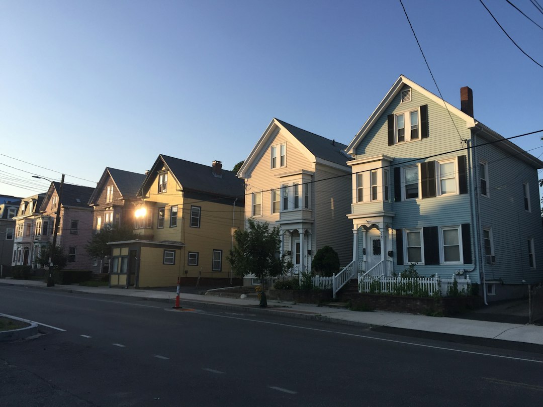 Row of houses at dusk in a residential neighborhood